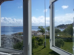 a view of a beach from a window