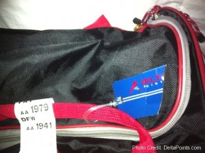 a black and red bag with a price tag