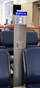 a silver pillar with power outlets