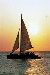 a sailboat with people on it