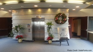 a lobby with a silver elevator