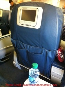 a bottle of water next to a seat