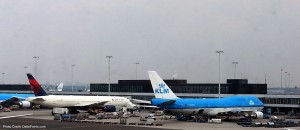 a group of airplanes at an airport
