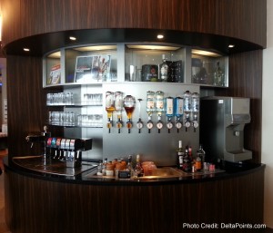 a bar with a variety of beverages