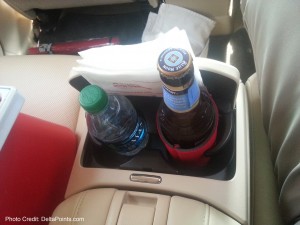 a drink holder with bottles in it
